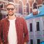 kicsi handsome-smiling-stylish-hipster-lambersexual-model-modern-man-dressed-red-checkered-shirt-fashion-male-posing-near-skyscraper-street-background-sunglasses-outdoors-sunset